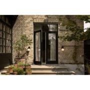 Nuura buitenwandlamp Liila, breedte 16 cm, zwart/opaak